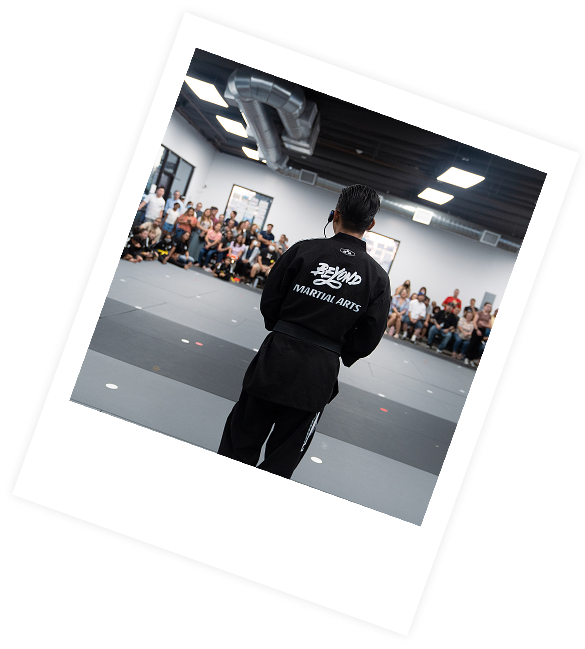 Master speaking to students and parents